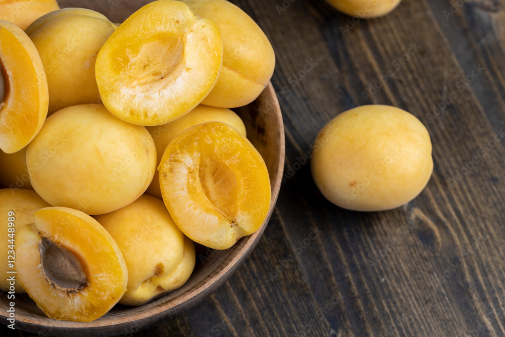 ripe soft apricot fruits on the cutting board ripe soft apricot fruits on the cutting board