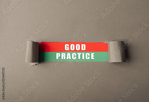 Torn piece of paper with the words Good Practice written on it photo