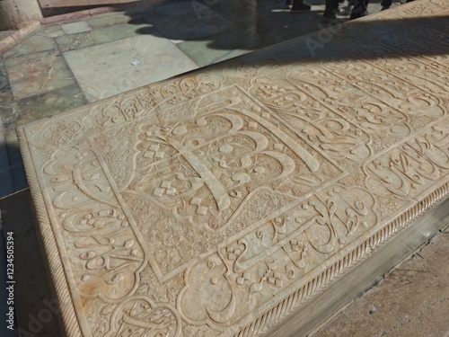 Shiraz, Iran - December 8, 2024: Quranic verses engraved on Hafiz Shirazi tomb photo