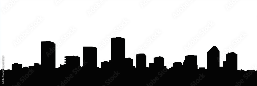 City skyline silhouette sunrise diverse range of buildings against bright sky City skyline silhouette sunrise diverse range of buildings against bright sky