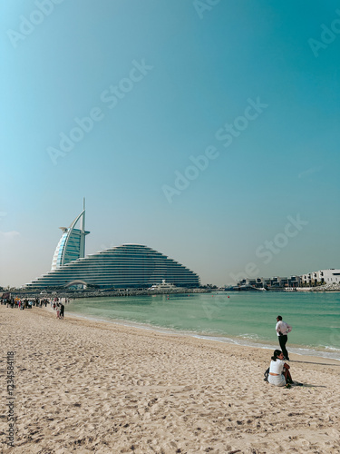 Konstfotografi people on the beach Burj Al Arab Dubai