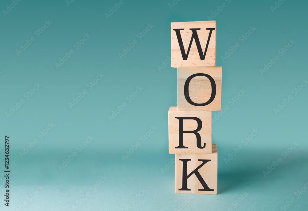 Stack of wooden blocks with the word work written on them Stack of wooden blocks with the word work written on them