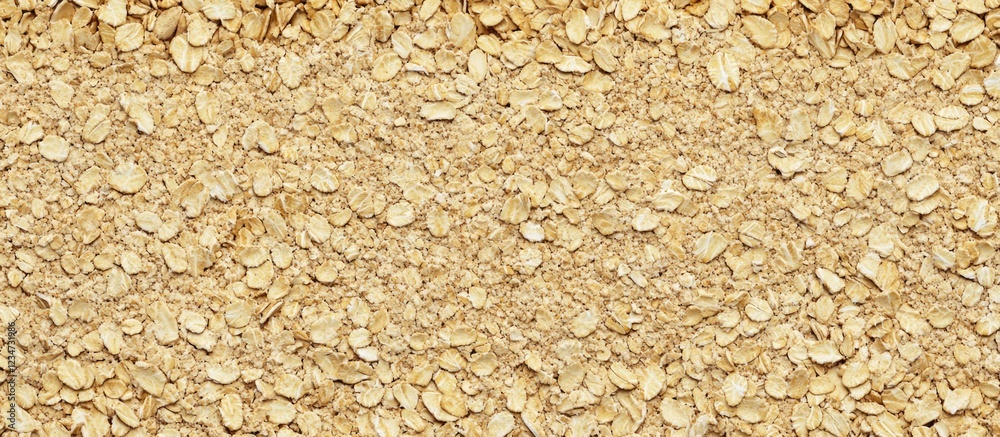 Close-up of rolled oats texture background with copy space for text or design elements Close-up of rolled oats texture background with copy space for text or design elements