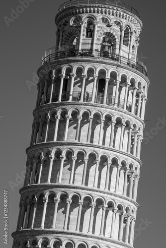 The Leaning Tower of Pisa or Tower of Pisa is the freestanding bell tower, of the cathedral of the Italian city of Pisa, known for its unintended tilt. photo