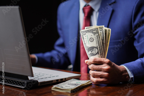 Billede på lærred Businessman in Blue Suit Holding U