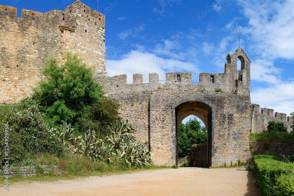 Fototapeta premium Walls of Convent of Christ in Tomar, Portugal The Convent of Christ (Mosteiro de Cristo) is a former Catholic convent in Tomar, Portugal. The convent and castle complex are UNESCO World Heritage site