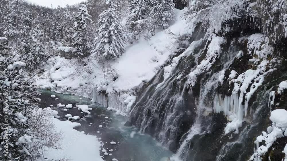 4K Aerial drone shot of Shirahige waterfall in winter while snow fall 4K Aerial drone shot of Shirahige waterfall in winter while snow fall
