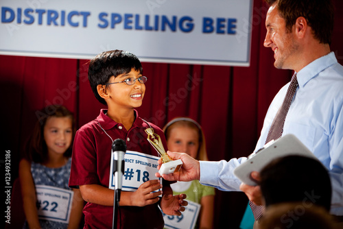 Spelling: Indian Boy Wins Award at Spelling Bee photo