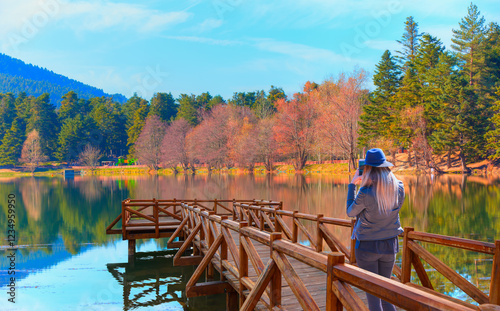 Young girl take a selfie near Golcuk National park - Bolu, Turkey photo