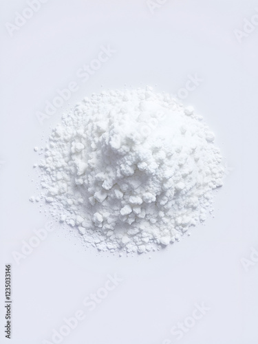 Pile of calcium sulfate on white background, known as micronized alabaster or micronized plaster photo