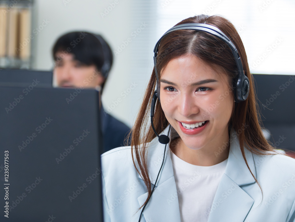 Asian woman call center agent, customer service, tech support with headphones working on computer for online consultant, assistance, customer support in call center office. Telemarketing and Business Asian woman call center agent, customer service, tech support with headphones working on computer for online consultant, assistance, customer support in call center office. Telemarketing and Business