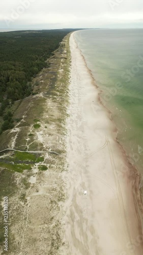 Flight over a sandy beach