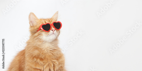 Cute ginger cat wearing heart-shaped sunglasses, symbolizing Valentine's Day and love. Perfect for greeting cards, phone wallpaper, or festive design projects. Isolated on a white background