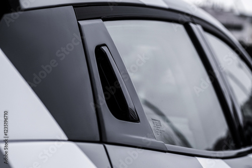 Close up car exterior. Modern car tailgate handle