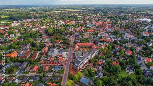  A wide aerial view of the downtown around the city Westerstede on a sunny summer day in Germany photo