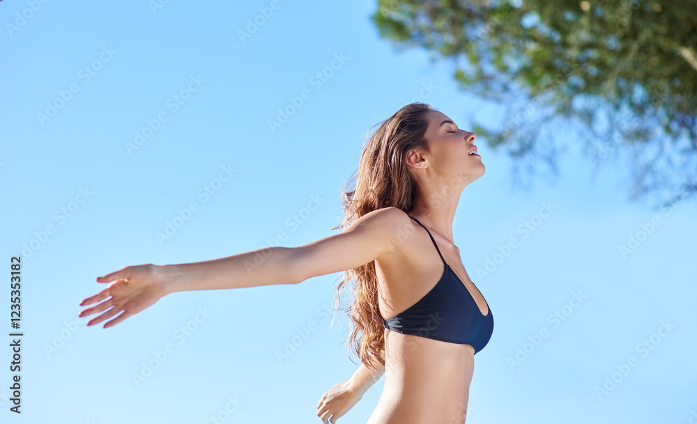 Relax, freedom and bikini with woman outdoors for summer vacation, tropical destination or adventure. Holiday trip, tourism and travel with person in blue sky mockup space for wellness and sunbathing Relax, freedom and bikini with woman outdoors for summer vacation, tropical destination or adventure. Holiday trip, tourism and travel with person in blue sky mockup space for wellness and sunbathing