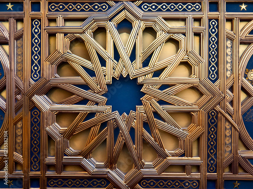 Symmetrical Islamic art with stars and crescents. photo