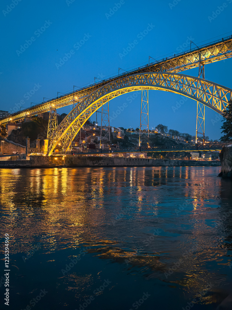 The iconic Dom Luís I Bridge, illuminated against the night sky, stands as a symbol of Porto s industrial heritage and architectural beauty. The iconic Dom Luís I Bridge, illuminated against the night sky, stands as a symbol of Porto s industrial heritage and architectural beauty.
