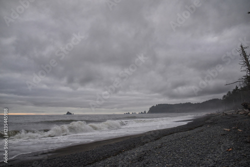 Rialto Beach beach and ocean island views at dusk in Olympic National Park, Washington State, USA.  photo