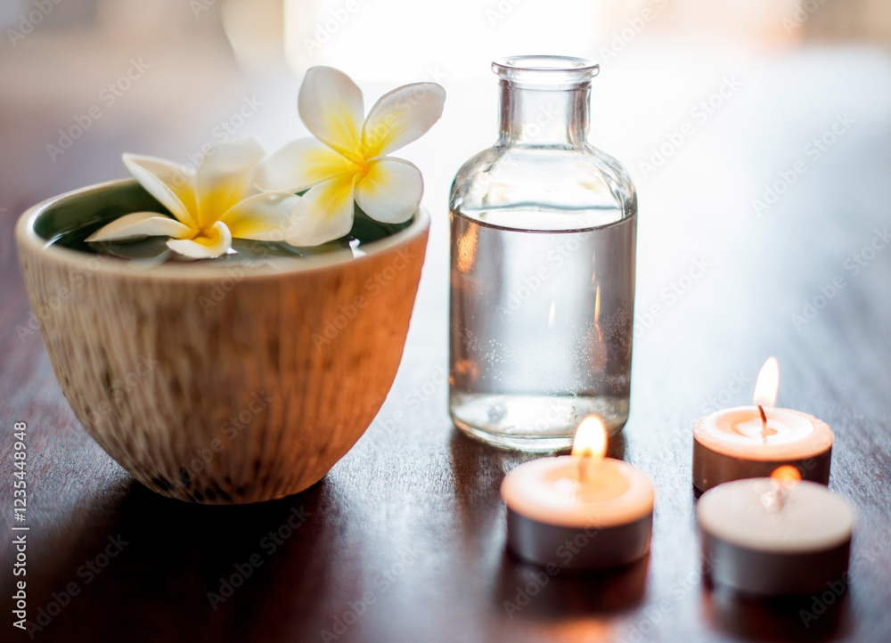 Flower, spa and aromatherapy candles on table with water bowl, peace and natural fragrance. Holistic health, hospitality service and counter with essential oil for self care at luxury wellness salon Flower, spa and aromatherapy candles on table with water bowl, peace and natural fragrance. Holistic health, hospitality service and counter with essential oil for self care at luxury wellness salon