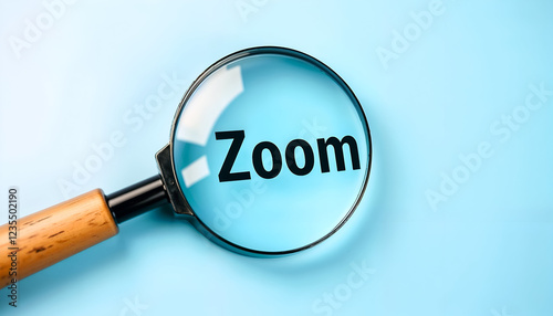 Magnifying glass with zoom text on blue background. 