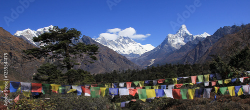 Картината върху платно Prayer flags and Mount Everest, Lhotse and Ama Dablam, view from Khumjung, Nepal