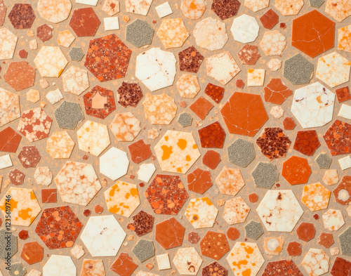 Hexagonal Breccia Pernice marble mosaic with angular fragments in terracotta tones, ideal for ancient Roman bathhouse restoration texture. photo