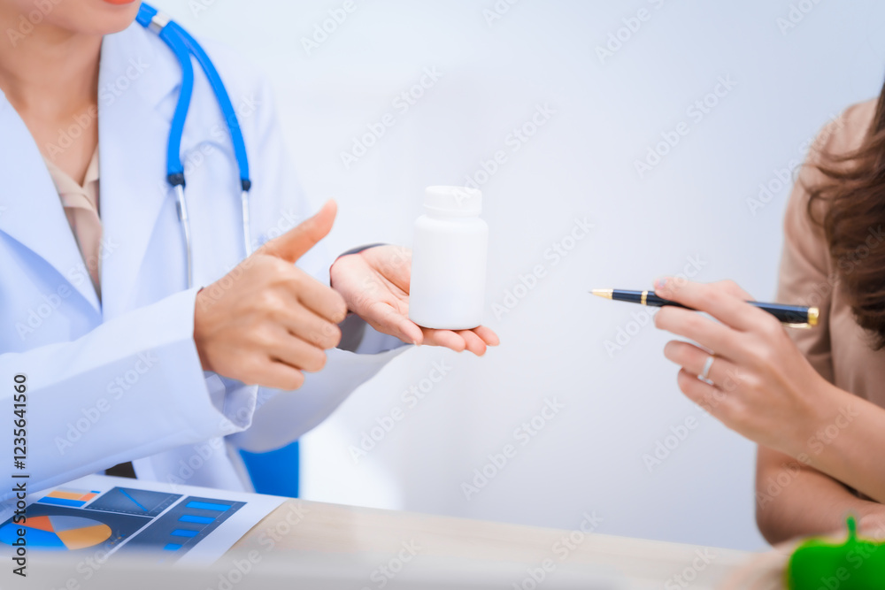 Fototapeta premium Female Asian nutritionist providing consultations for weight loss. reduce belly fat, offering advice on nutrients, metabolism, hydration, balanced diets to improve overall health and wellness.