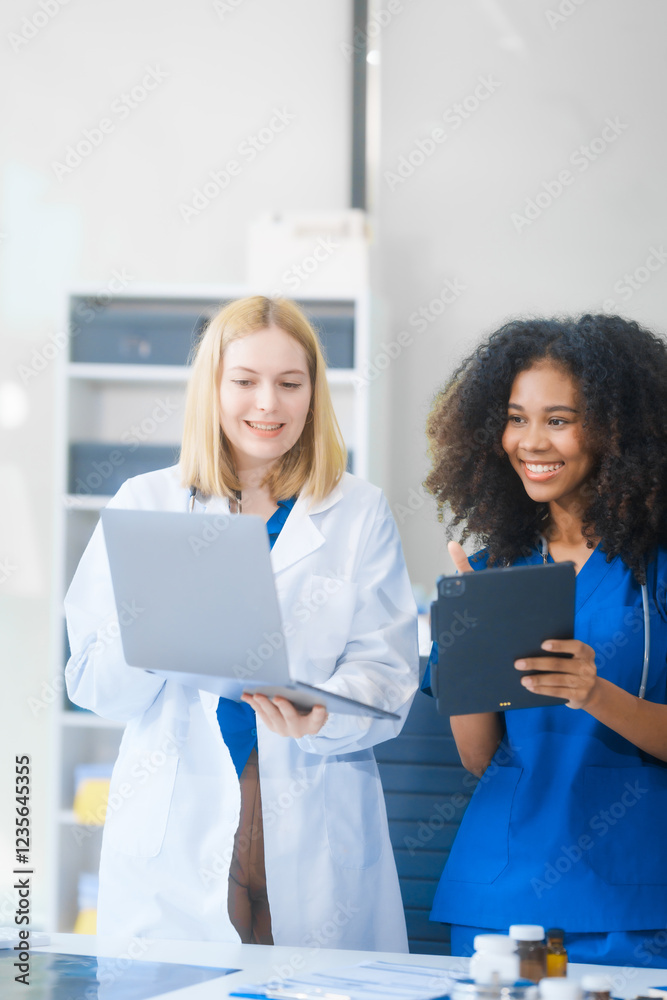 Young African American and Russian woman, both scientists, collaborate to analyze blood samples, viruses, vaccines using microscopes. They conduct crucial medical and biological research. Young African American and Russian woman, both scientists, collaborate to analyze blood samples, viruses, vaccines using microscopes. They conduct crucial medical and biological research.