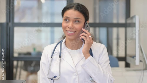 Wallpaper Mural Portrait of African Female Doctor Talking on Phone Torontodigital.ca