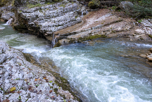 The canyon of the mountain river is a channel in a mountainous area with bizarre patterns and depressions