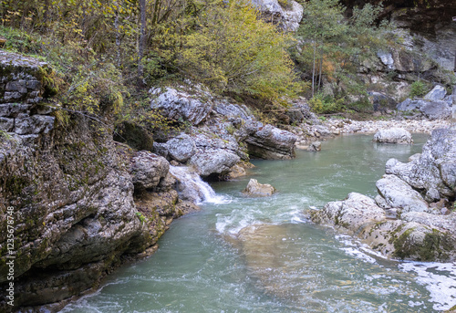 The canyon of the mountain river is a channel in a mountainous area with bizarre patterns and depressions