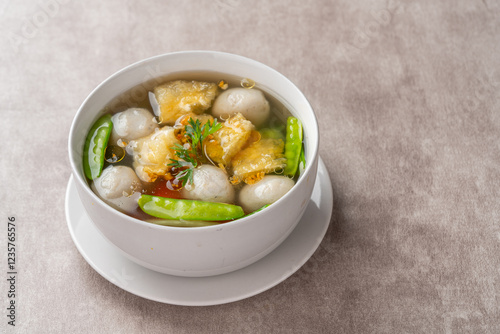 Fish Ball Soup with Fish belly crackers are called hipio photo