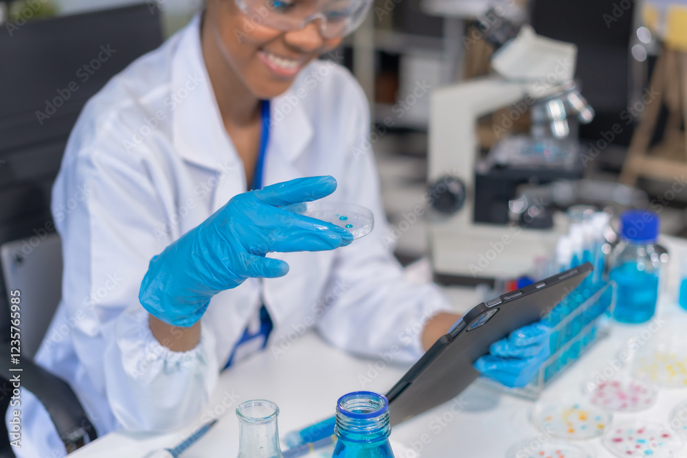 Fototapeta premium Healthcare professional holding vaccine in laboratory study and analyze scientific sample of antibody.