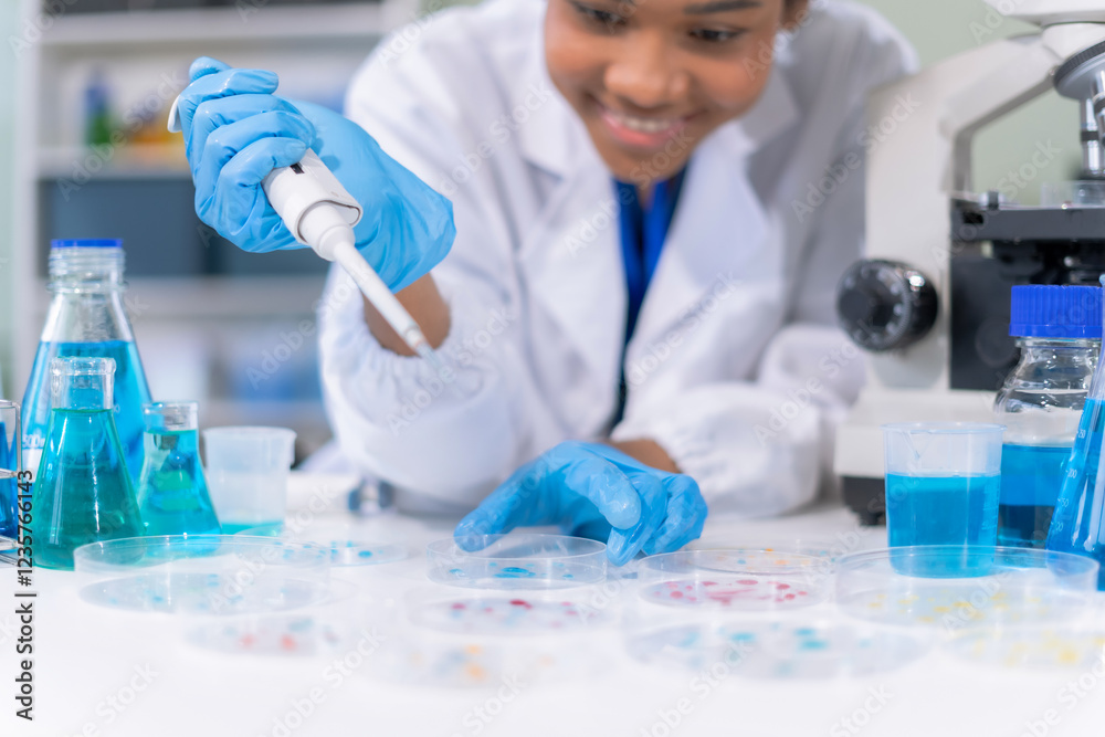 Fototapeta premium Healthcare professional holding vaccine in laboratory study and analyze scientific sample of antibody.