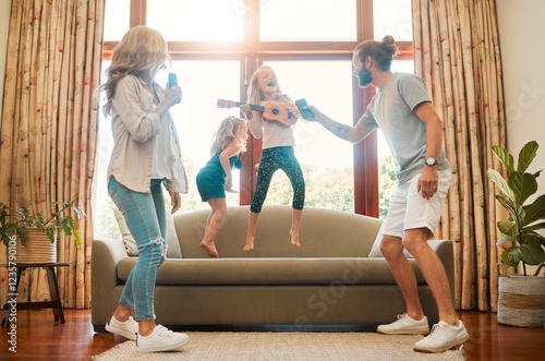 Guitar, singing and parents dancing with children in home for bonding, fun and entertainment. Happy, playing and girl kids groove with mom and dad with string instrument for music together in house.