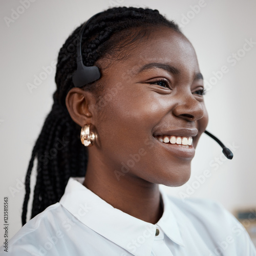 Black woman, headset and telemarketing operator in office, call centre agent and customer service. Female person, smile and consulting professional in workplace, helping client and support care