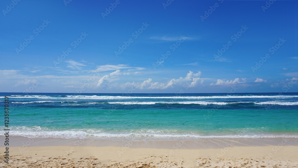 Fototapeta premium Melasti Beach is beautiful with white sand and blue sea water