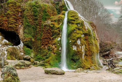 Winter morning atmosphere at the moss covered waterfall photo