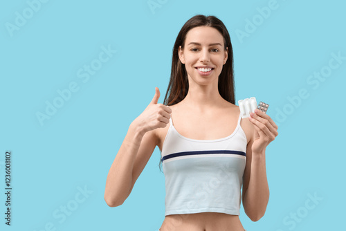 Beautiful young woman with ...