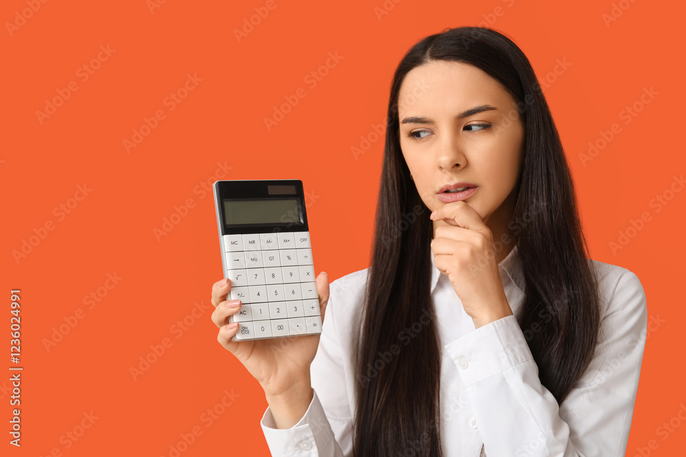 Thoughtful young woman with calculator on orange background Thoughtful young woman with calculator on orange background