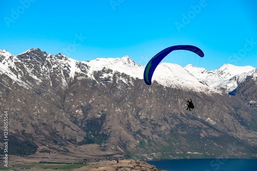 Paraglider over The Remarkables, Queenstown, New Zealand