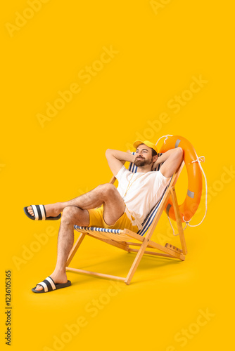 Beach rescuer sitting on de...