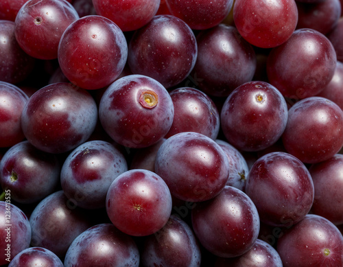 Close up of raw organic sweet red grapes background, wine grapes texture, Healthy fruits Red wine grapes background, top view