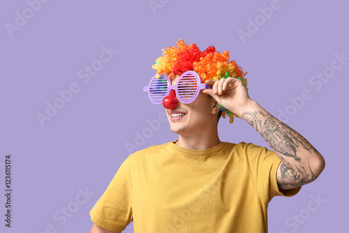 Young man in clown disguise...