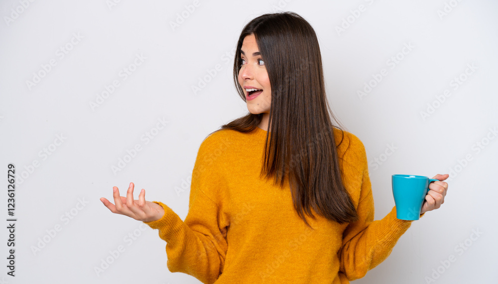 Φωτογραφία Young Brazilian woman holding cup of coffee isolated on white background with su