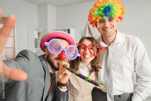 Young colleagues with funny...