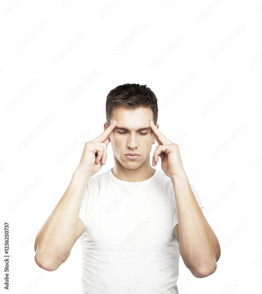 Fototapeta premium Young man focusing with closed eyes, fingers placed on temples, isolated on a clean white background, conveying concentration or meditation