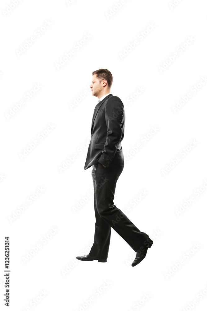 Man wearing a formalsuit walking side view with hands in pockets on white background. Professional, business concept, isolated style Man wearing a formalsuit walking side view with hands in pockets on white background. Professional, business concept, isolated style