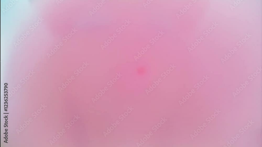 a woman blows bubblegum bubble